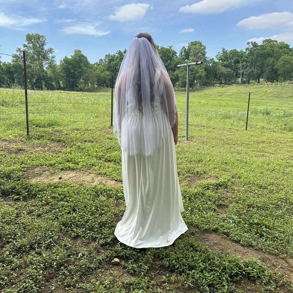 One shoulder white floor, length gown